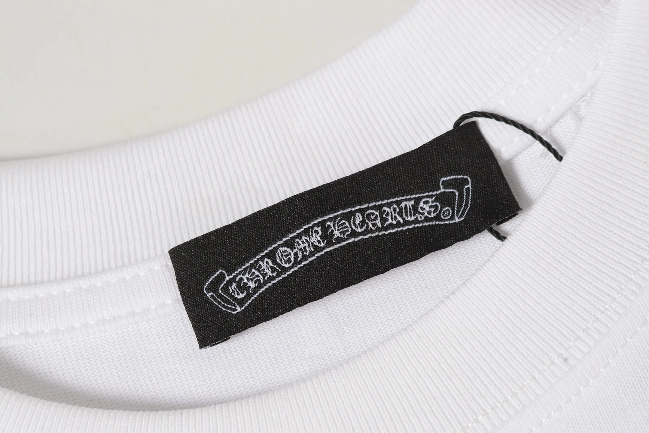 P160 💰 Actual pictures [High-end quality] Code: 8913# Color: Black White Size: S to XXL 2026ss Internet celebrity cross🔥New Chrome Hearts 320g customized fabric Chrome heart round neck short sleeves Use personalized embroidered tassel technology Loose version for men and women